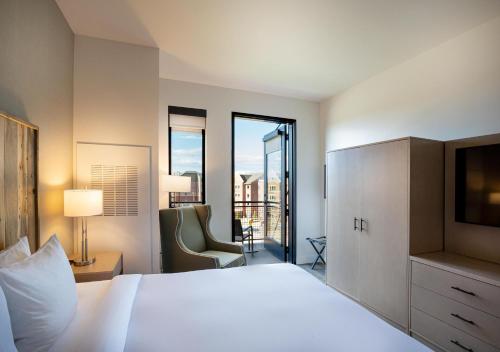 Postel nebo postele na pokoji v ubytování Hotel Maverick