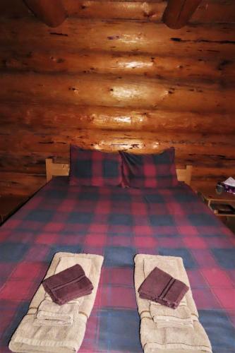 Postel nebo postele na pokoji v ubytování Rocky Ridge Resort-BC