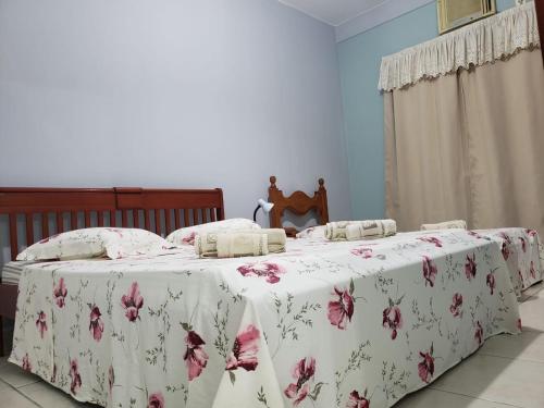 Cama ou camas em um quarto em Apartamento PÉS NA AREIA