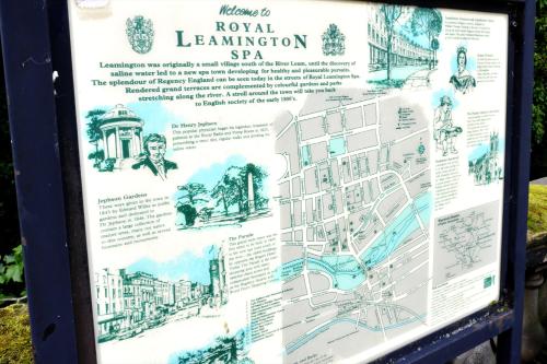 a sign for the royal leamington spa at Leamington Spa Warwick Place Apartments in Leamington Spa