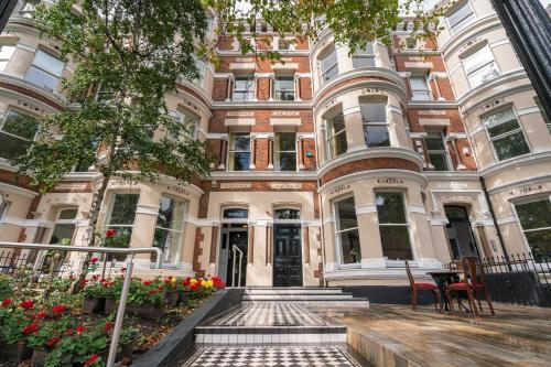 a building with flowers in front of it at The Harrison Chambers of Distinction in Belfast