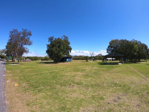 a park with a gazebo in the grass at Ballina Beach Nature Resort in Ballina