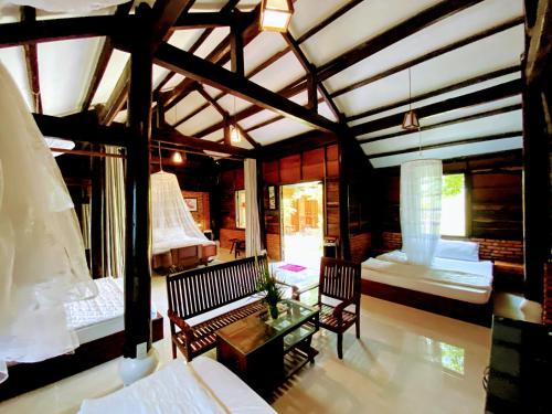 Кровать или кровати в номере Lagi Dinh Relax Hotel