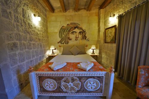 Cama o camas de una habitación en Caftan Cave Suites