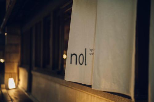 a no sign on the side of a window at nol kyoto sanjo in Kyoto