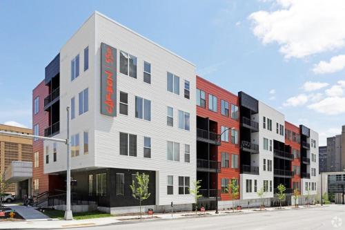 a rendering of an apartment building on a street at Kasa Downtown Des Moines in Des Moines