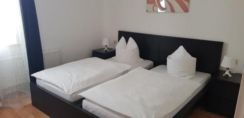 Ένα ή περισσότερα κρεβάτια σε δωμάτιο στο Hotel Cherusker Hof