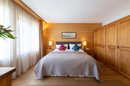 Uma cama ou camas num quarto em Chalet Balthazar