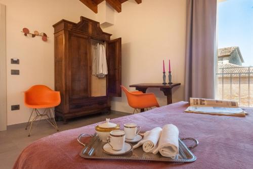 Le Ferrerie agriturismo fattoria Marchesiniにあるベッド