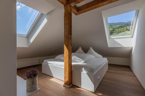 A bed or beds in a room at Villa Blau