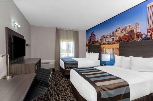Letto o letti in una camera di Wingate by Wyndham Horn Lake Southaven