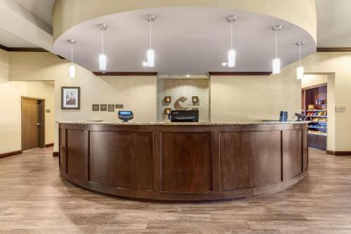 a large room with a large counter and a large window at Comfort Suites Frisco in Frisco