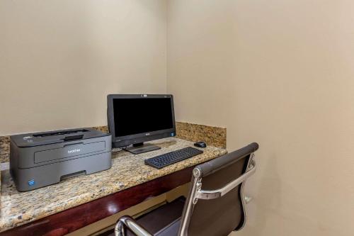 a desk with a computer and a printer on it at Comfort Inn Saint George North in St. George