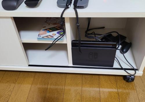 a drawer in a desk with a computer equipment at Bluebird Hotel in Fujikawaguchiko