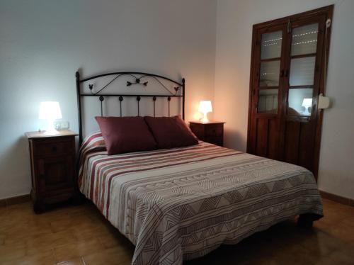 Ένα ή περισσότερα κρεβάτια σε δωμάτιο στο La Villa
