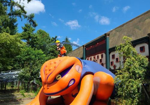a person is riding on top of an inflatable toyanimal at Bluebird Hotel in Fujikawaguchiko