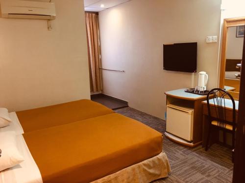 Katil atau katil-katil dalam bilik di Coastal Park Hotel