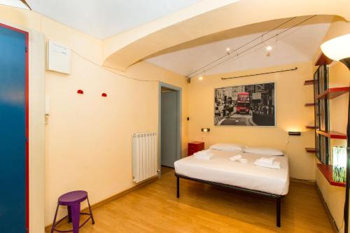Ένα ή περισσότερα κρεβάτια σε δωμάτιο στο Porta Nuova Central Flat with Balcony