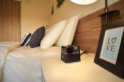 Кровать или кровати в номере Wyndham Garden North Bergen - Secaucus