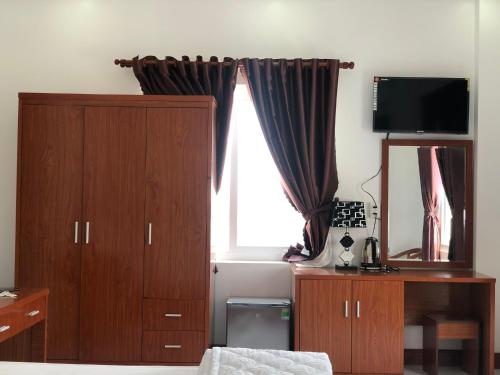 TV a/nebo společenská místnost v ubytování hotel đăng khôi 2
