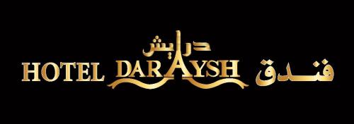 a gold sign that reads hotel darvaise at Daraysh Hotel in Sharjah