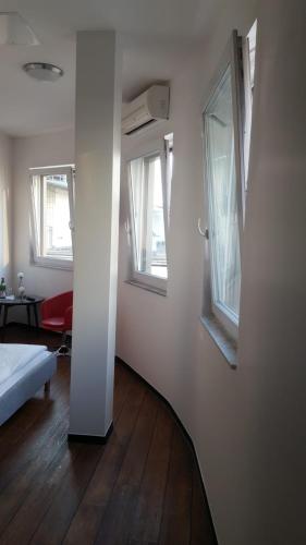 Postel nebo postele na pokoji v ubytování Art Rock Downtown Hotel