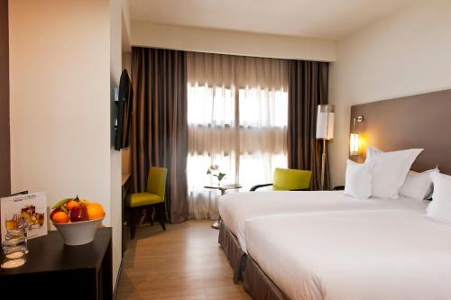 Una cama o camas en una habitación de Barceló Casablanca