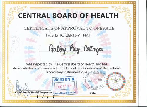 un certificato di approvazione di un'organo odontoiatrico di sanità di Aloe Villa a Five Islands Village
