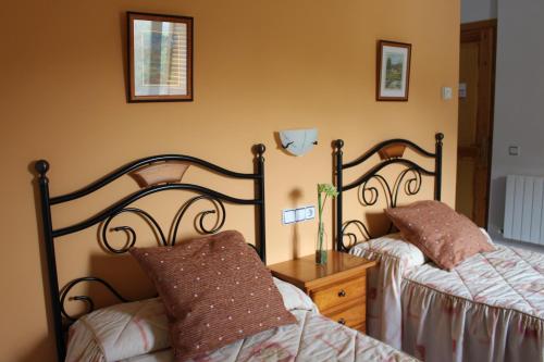 Ένα ή περισσότερα κρεβάτια σε δωμάτιο στο Hostal Casa Vispe