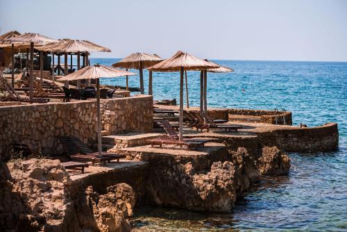 Galería fotográfica de David Lux beach rooms en Dobra Voda