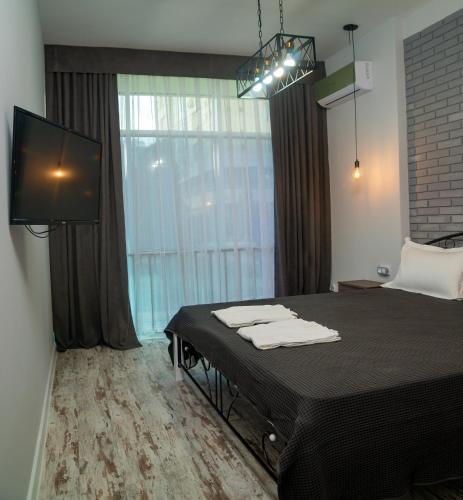 Postel nebo postele na pokoji v ubytování Hi hotel