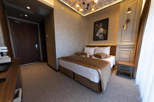 Katil atau katil-katil dalam bilik di Tonight Hotel Port