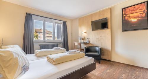 
Ein Bett oder Betten in einem Zimmer der Unterkunft feRUS Hotel
