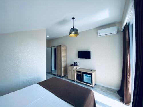 Una cama o camas en una habitación de Villa Royal
