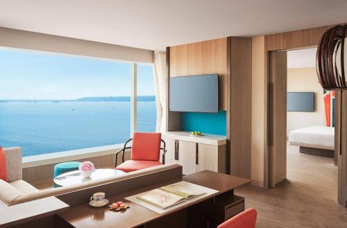 a hotel room with a view of the ocean at Taj Cidade de Goa Horizon, Goa in Panaji