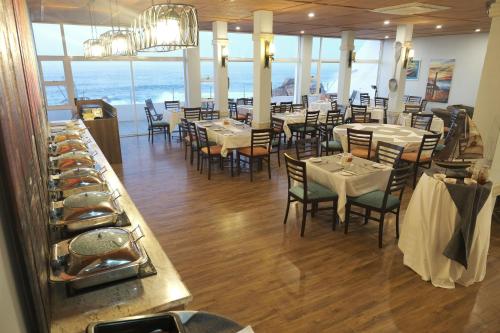 Um restaurante ou outro lugar para comer em The Point Hotel & Spa