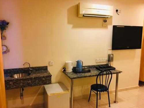 Dapur atau dapur kecil di Coastal Park Hotel
