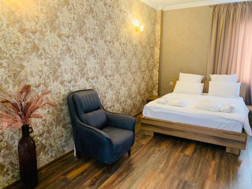 Postel nebo postele na pokoji v ubytování Wald Hotel Lagodekhi Rooms