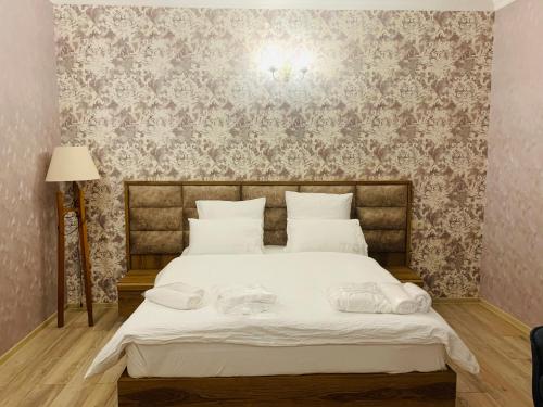 Postel nebo postele na pokoji v ubytování Wald Hotel Lagodekhi Rooms