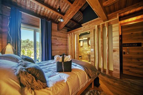 Postel nebo postele na pokoji v ubytování BAITA MAORE luxury rooms & Spa