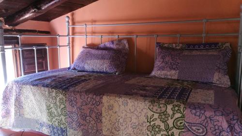 Katil atau katil-katil dalam bilik di El Soportalillo de la Fuente Vieja