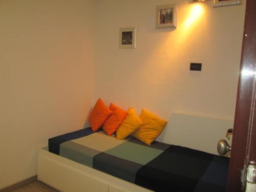 En eller flere senge i et værelse på Cervinia appartamento Pineta