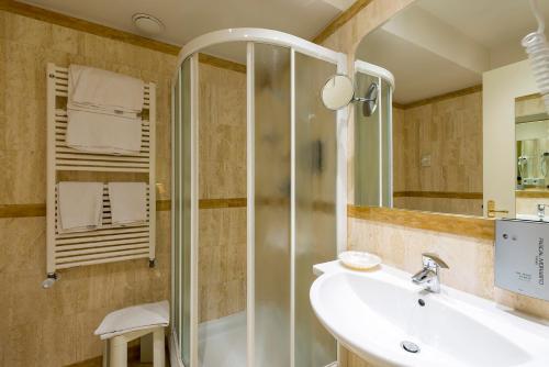 Koupelna v ubytování Hotel 4 Stagioni Sensus Spa