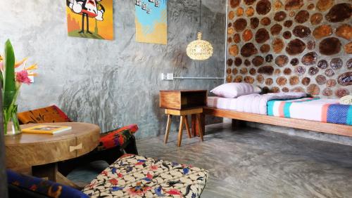 Postel nebo postele na pokoji v ubytování The Kasbah Langkawi