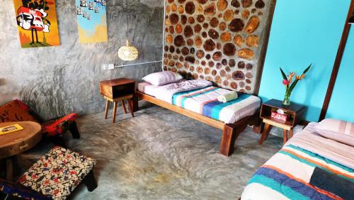 Postel nebo postele na pokoji v ubytování The Kasbah Langkawi