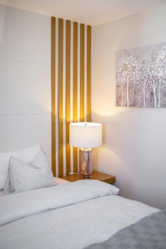 Ένα ή περισσότερα κρεβάτια σε δωμάτιο στο Apartma Tinkara