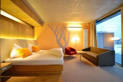 En eller flere senge i et værelse på Antonie Hotel****superior