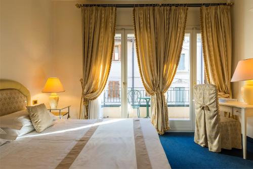Katil atau katil-katil dalam bilik di Hotel 4 Stagioni Sensus Spa