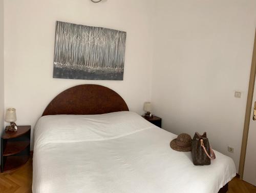 Ένα ή περισσότερα κρεβάτια σε δωμάτιο στο Vila Bilo