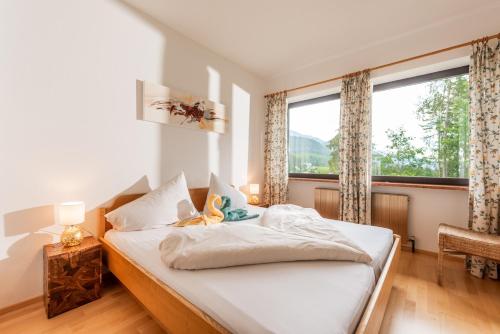 Postel nebo postele na pokoji v ubytování Landhaus Blaubeerhügel